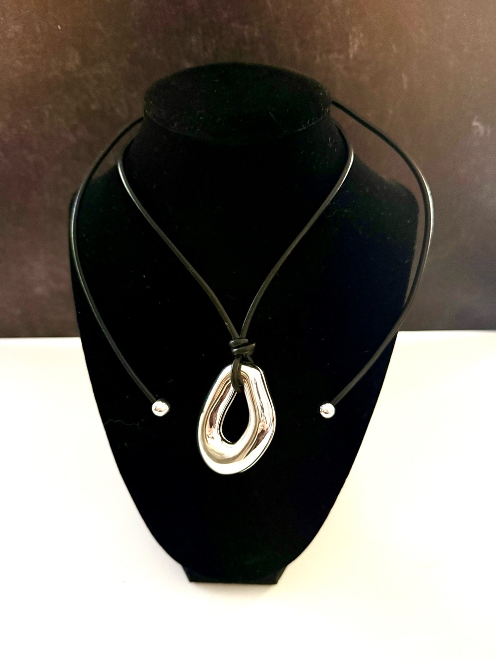 Contemporary Silver Teardrop Pendant Necklace on Black Cord